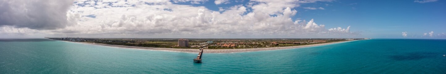 Aerial panorama Juno Beach Fishing Pier Florida coastline © Felix Mizioznikov