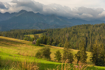 Beautiful views of the Polish High Tatras with mountain lakes and picturesque houses in the summer season