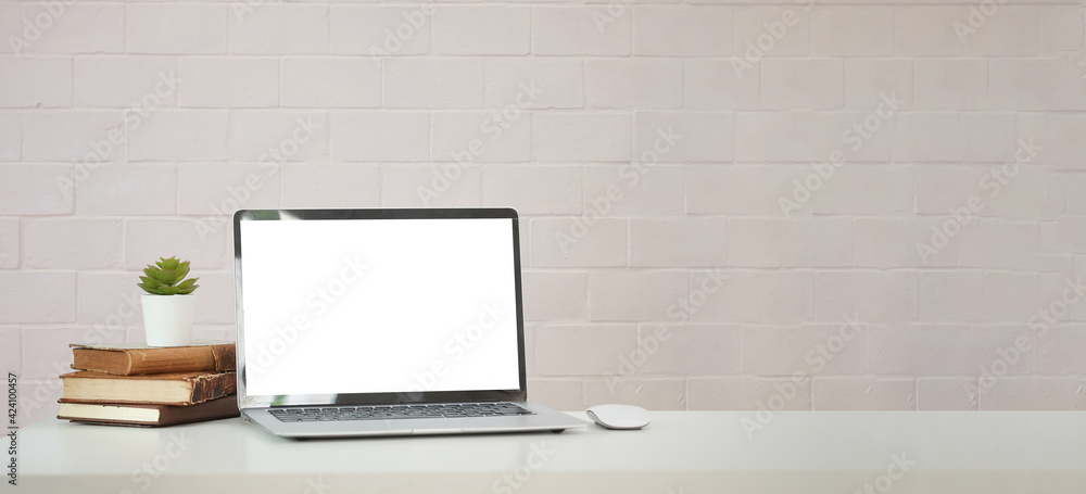 Poster modern workspace with computer with blank screen and equipment on white table.blank screen for your 