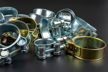 close-up of metal clamps on black background