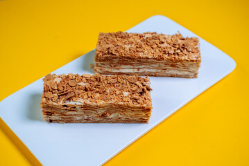 Honey cake on a yellow background