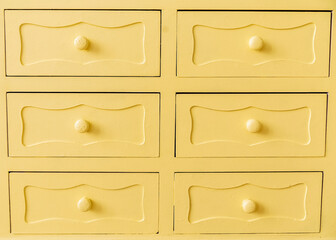 Yellow vintage cabinet doors close up
