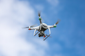 Fototapeta na wymiar Drone quadrocopter with high resolution digital camera on the sky background.
