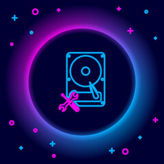 Glowing neon line Hard disk drive with screwdriver and wrench icon isolated on black background. Adjusting, service, setting, maintenance, repair, fixing. Colorful outline concept. Vector