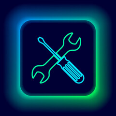 Glowing neon line Crossed screwdriver and wrench tools icon isolated on black background. Service tool symbol. Colorful outline concept. Vector