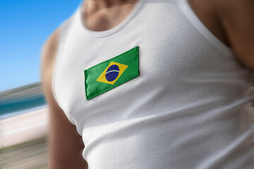 The national flag of Brazil on the athlete's chest