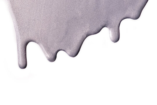 Light gray liquid drops of paint color flow down on white background. Abstract silver backdrop with fluid drip pattern.