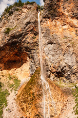 Rinka waterfall located in Logarska dolina national park in Slovenia, Second highest waterfall in Slovenia. Popular hiking destination in the Alps © Zedspider
