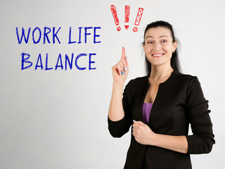 Financial concept meaning WORK LIFE BALANCE exclamation marks with sign on the wall