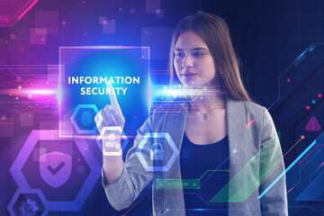 Business, Technology, Internet and network concept. Young businessman working on a virtual screen of the future and sees the inscription: Information security