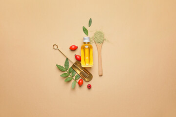 Composition with bottle of natural cosmetic oil on color background