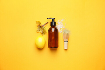 Composition with bottle of essential oil on color background