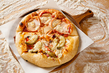 homemade pizza with vegetables and cheese