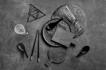 Kitchen utensils on dark background