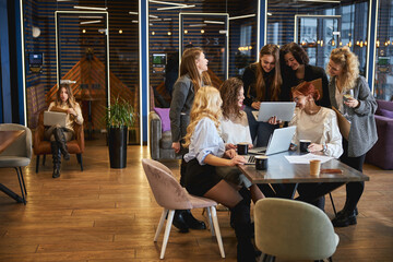 Creative team working on business project in modern office