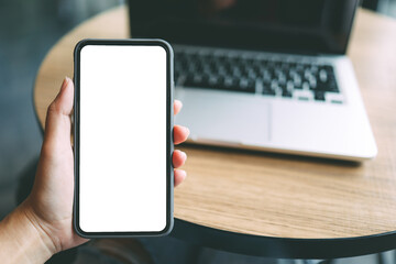 Women's hands holding cell telephone blank copy space screen. smartphone with blank white screen isolated on white background . smart phone with technology concept