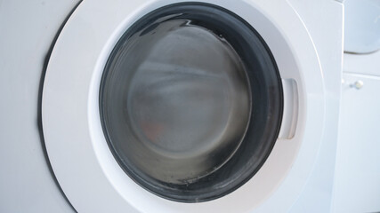 rotating drum washing machine, close up