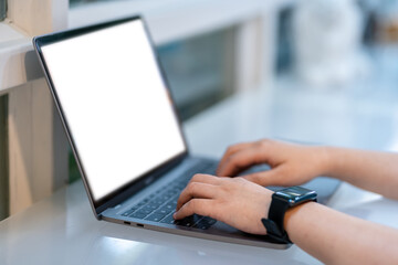 Close-up of freelance people businessfemale wearing generic design smartwatch working with laptop computer and smartphone in at the cafe,Business Lifestyle communication concept