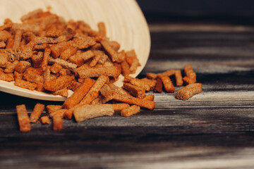 croutons on a plate snacks for beer snack wooden table