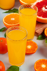 Orange juice cup on table close up
