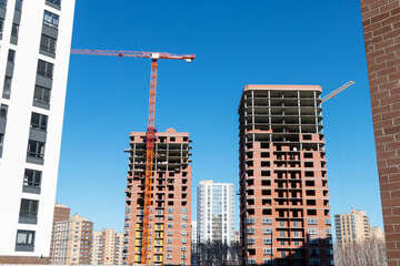 Fototapeta na wymiar Construction of a multi-storey high-rise apartment building