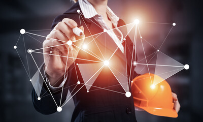 Businesswoman pointing on abstract 3d network