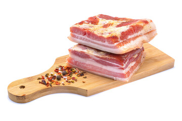 delicious homemade raw-smoked, cured bacon, lard, isolated on a white background.