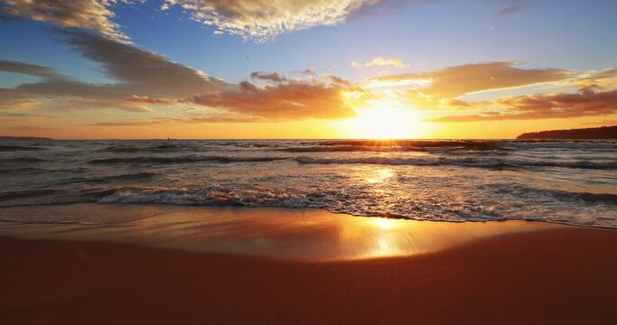 Ocean beach colorful sunrise, 4k video. Morning over the sea.
