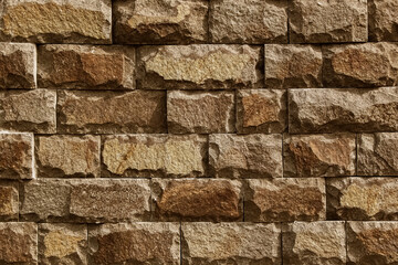 Fototapeta premium Background texture of brown stone wall.