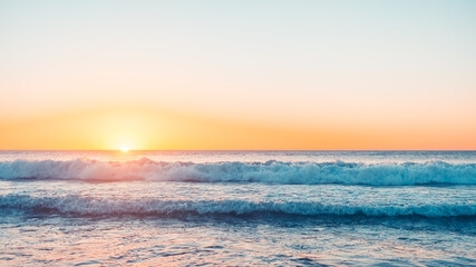 Naklejka na ściany i meble Waves crashing at sunset, Moana Beach, South Australia