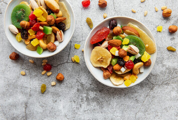 Bowls with various dried fruits and nuts