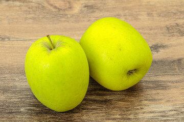 Two ripe green sweet apples