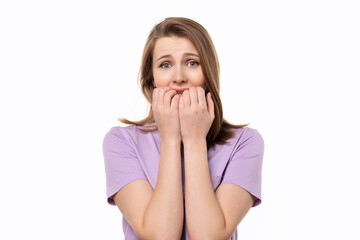 close up shocked young woman covering her mouth with hands, isolated on white background