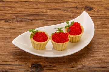 Apetizer - tartlet with red caviar