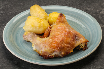 Roasted chicken leg with potato