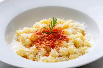 gnocchi with tomato sauce and parmesan cheese