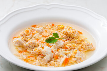 fish soup with fish eggs and vegetables
