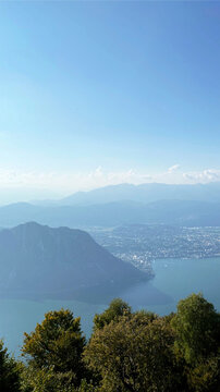 View from Mount San Salvatore. View of the mountains, Lake Lugano and Campione di Italy. Switzerland © TonzTonz