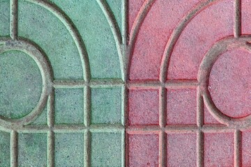 Exterior stone floor tiles with green and red lines pattern and background seamless