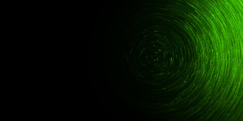 green light particles in a circular rotation