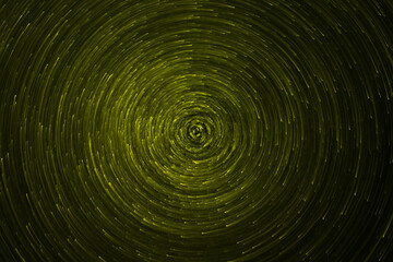 green light particles in a circular rotation