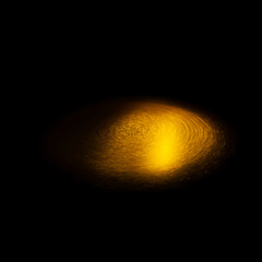 gold and yellow light particles in a circular rotation
