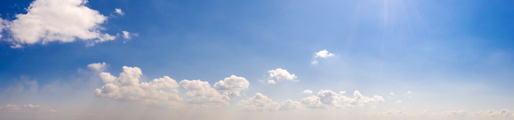 Wide sky panorama with scattered cumulus clouds