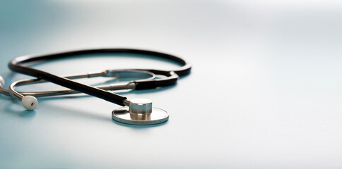 Black stethoscope, health care concept.
