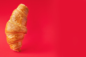 fresh croissant on colored background sweet bakery dessert bun snack healthy meal top view copy space for text rustic food background top view