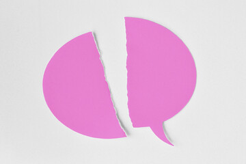 Broken pink speech bubble on white background - Concept of woman and communication problems