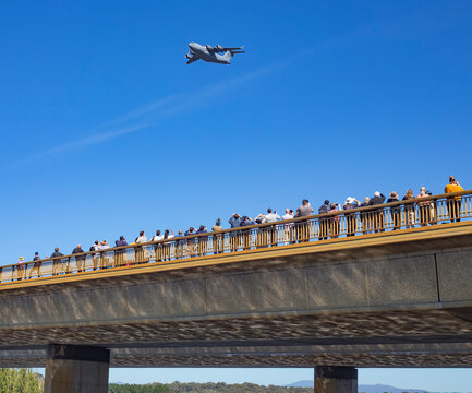 Aircraft bombers flying overhead at Lake Burley Griffin during an aerial fly over event in Canberra to mark 100 years of the Royal Australian Air Force