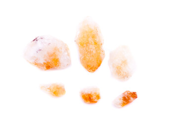 Macro mineral of Citrine stone on white background