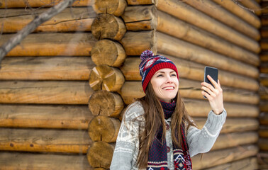 Portrait of young woman in casual winter attire outdoors