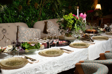 Tables served for special occasion, decorated with flower